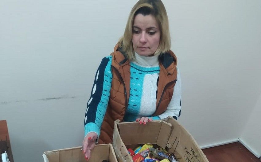 Avtomobilində pirotexniki vasitələr satan qadın saxlanıldı