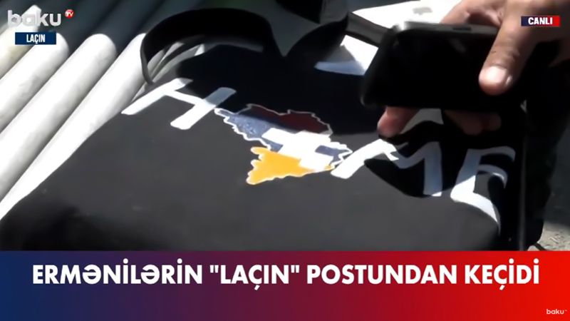 Erməni qadından bayraq təxribatı –     VİDEO