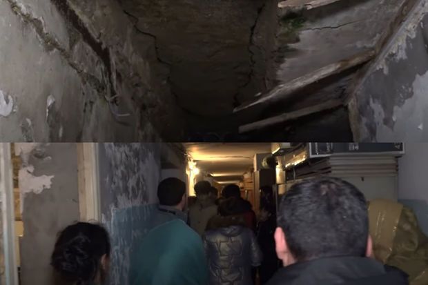 Binəqədidə beton hissələri sökülən binada gərgin anlar yaşandı: Əhali yolu bağladı -     VİDEO