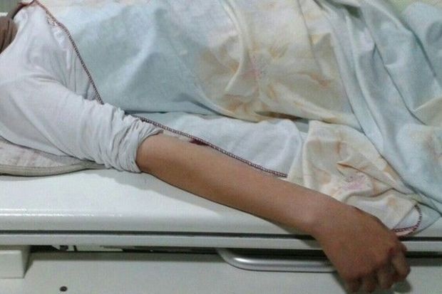 Suraxanıda 18 yaşlı gənc özünü işıq dirəyindən atdı