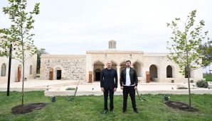 Prezident İlham Əliyev Ağdam şəhərində İmarət Kompleksinin bərpadan sonra açılışında iştirak etdi -   FOTO - YENİLƏNDİ — foto 12